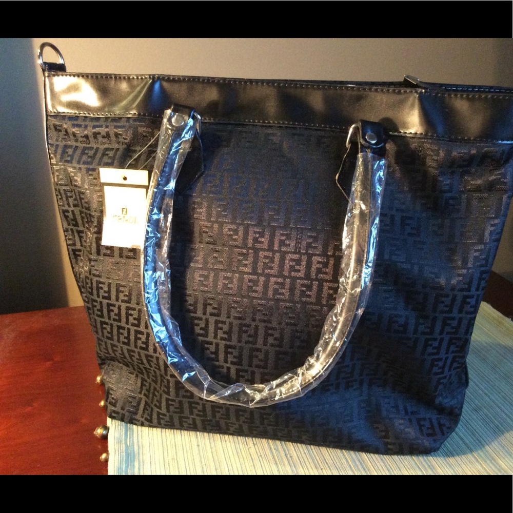 TODAY’s DEAL: NWT Black logo purse (from $95)